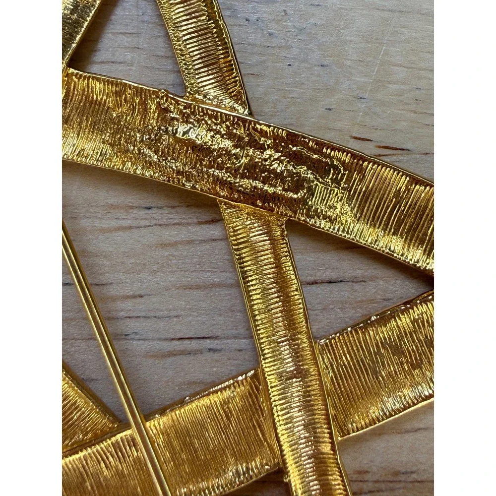 Yves Saint Laurent type brooch